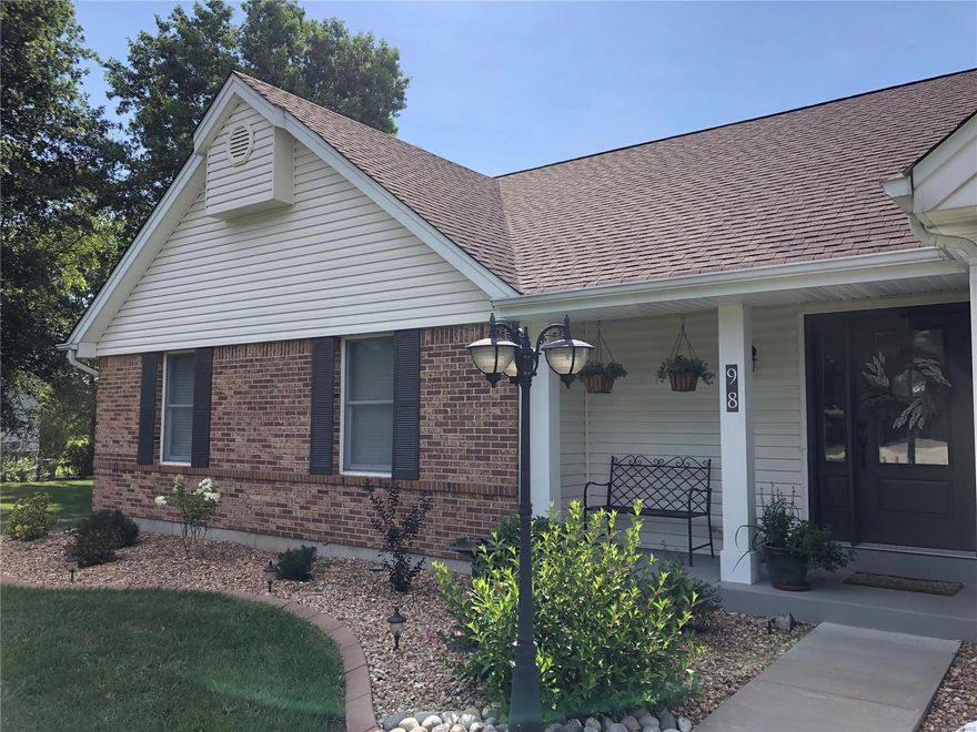 Beautiful open ranch floor plan located in the charming golf cart community of Cottleville.  Enjoy the various trails, restaurants, parks, and shopping in this scenic community.  This home boasts new custom kitchen cabinets, appliances, quartz counters, corner walk-in pantry, chimney hood, new exterior doors, and light fixtures.  The great room and hearth room include vaulted beams with a fireplace in each room.  The spacious 3 car side entry garage is 27 x 24 with newer insulated overhead doors.  Master and hall baths adorned with updated cabinetry.  Quartz counter tops and double sinks in the master. There are 2 large patios to enjoy the vast .6 acre lot that backs to the subdivision owned common ground and 2 stocked lakes for fishing.  Home is located within the Francis Howell School District including Warren Elementary, a Missouri Gold Star School.