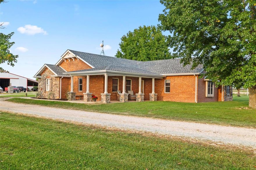 Ranch Paradise Awaits! This stunning 228-acre ranch, one of the finest in the area. The property showcases expansive hayfields, sizable pastures, perimeter and cross fencing, tire waterers, ponds, a year-round spring, and steel cattle working pens with an under-roof head chute. The impressive hay barn measures 60x105 with 30x135 lean-to to park all your equipment under one roof. In addition, it includes a 30x40 shop, a 30x64 four-bay machine shed. There are 47 acres of marketable timber, perfect for hunting in the box blind located on the back side of the property. This charming 2,000+ sq ft stone and brick home features 3 bedrooms, 2 bathrooms, a magnificent trophy room, and a beautiful fireplace. The home also includes a storm shelter, and a new roof installed August 2024.