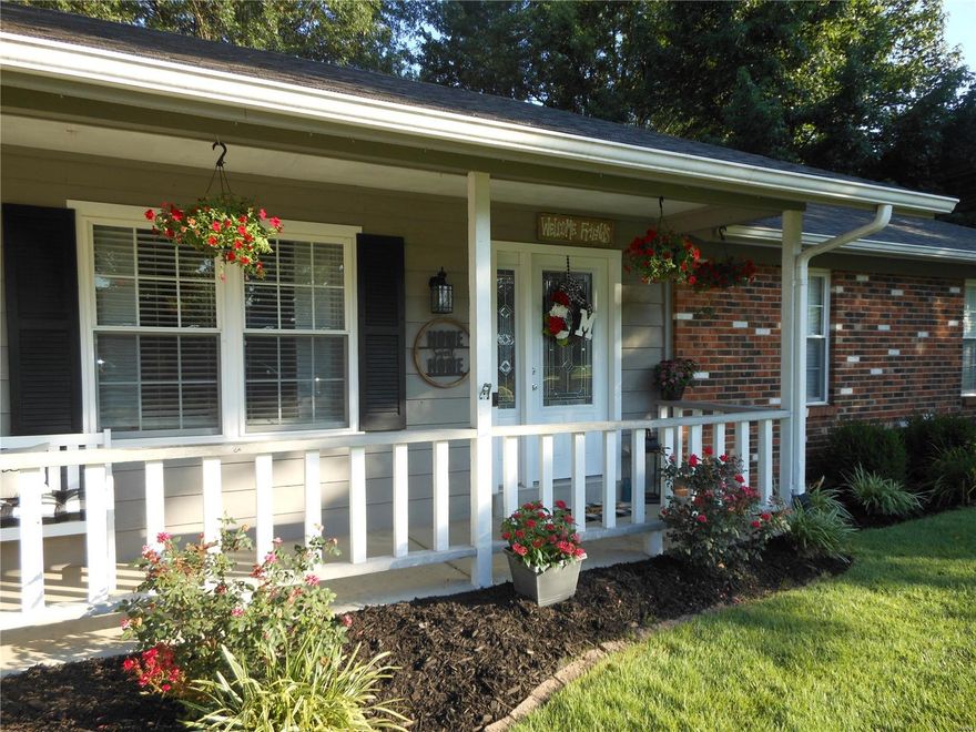 Come home to YOUR dream! You can tell the moment you pull up that this home has been LOVED! Lush landscape front & back and a huge covered front porch welcomes you! Leaded front door with sidelight bathes the living & dining rooms with natural sunlight! Trendy touches with attention to detail that are designed with kids & pets in mind! Upscale laminate thruout both levels! Updated vaulted Kitchen is open to Family Room for the ultimate in entertaining PLUS you can take the party outside! White cabinetry w/crown & stainless appliances! Whitewashed w/b fireplace, birdcage spindles, nickel lighting, nickel cabinet & door hardware, both baths updated. Finished lower level boasts massive playroom & TWO offices for the telecommuters! HUGE, LEVEL, FENCED backyard with newer above ground pool (will remove if requested), big patio, firepit --everyone’s going to want to BBQ at YOUR house now! Cool greys/neutrals paint. This home leaves a lasting impression that you’re going to love, I promise.