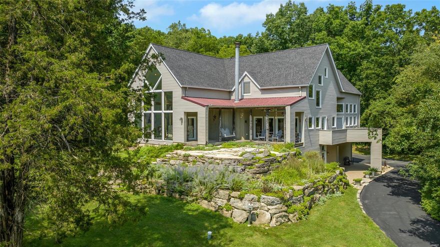 Looking for a one-of-a-kind equestrian property? You found it! This gorgeous property is just outside of town, yet is private, quiet, & serene. This home is one of the most unique in the area: mid century modern meets rustic! White vinyl fence greet as you approach the majestic horse statue pillars. Enter the home through the custom wood front door into the foyer where you'll find exposed wooden beams, 2 story ceilings, tons of windows, & decks that overlook your private oasis. Main floor primary and laundry rm, large open living space, finished basement & geothermal heat make this the perfect home for most any life stage. Lovely inground pool completes this perfect package! The 36x48 barn features 4 12x12 stalls, tack room, feed room, & open storage. Dutch doors in each stall lead out to covered area and into the arena. Additional run-in shed also nearby. All overlooking approx. 9 acres of lush pasture. So many unique, high quality features! See special features page for more details. Additional Rooms: Mud Room