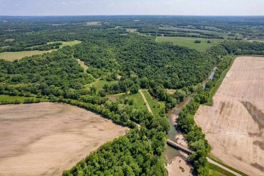 Awesome Hunting farm in a prime location!!  Located in N Pike County, part of this property also lays in Ralls County along Spencer Creek. Well managed area known for trophy bucks and consistently has gobbling turkeys in the spring. Farm offers approx. 30 acres tillable w/ balance in food plots, wooded ridges & brush. Wet weather creek runs through the middle of timber & 2 ponds provide ample water. Spencer Creek defines western boundary offering big rock outcroppings w/ great views to watch the sunset Newer 40x60 shed w/ 12x12 porch offers storage for equipment or could be finished living space making an excellent hunting camp. Rural water nearby. 5 Banks blinds will convey with sale. Extensive trail system provides great access throughout the property.  Great location in proximity to Wentzville or Hannibal. Plenty of build sites for a home or cabin!! This farm is ready to hunt