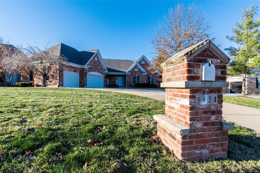 MUST SEE WATERFRONT ATRIUM RANCH on Lake St. Louis! Spacious 5 bedroom home perfect for entertaining with fabulous outdoor kitchen, lakeside deck and a private boat dock! Step inside the entry foyer and be greeted w/atrium windows, wood floors, coffered ceiling, floor to ceiling stone fireplace & separate dining/office area. Gourmet kitchen w/Jenn-Air 6 burner range, pot filler, custom stone wall, top of the line stainless appliances, over-sized island, granite & custom cabinets. Hearth room w/vaulted ceiling, built in cabinets & full stone wall surrounding fireplace. Step out to deck w/screened area. Laundry room off kitchen w/built-ins & utility sink. Master suite w/coffered ceiling, luxury bath & private deck. Finished walk-out lower level has 2 additional bedrooms & full bath. Custom bar w/wine cellar, rec room w/3rd fireplace, media/family room and craft room w/extra storage.  Amazing outdoor kitchen includes a stone pizza oven, outdoor appliances, & fireplace. Additional Rooms: Mud Room, Wine Cellar