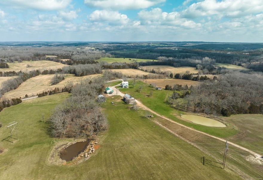 Looking for acreage in Springbluff? Well here it is & alot of it! This property features 167 acres of open fields, boone creek crossing, 3 ponds and some amazing views to be able to watch your cattle/horse feed, build your dream home, hunt/fish, ride your ATV or even just have a weekend staycation! The property has an old 3 bedroom 1 bath farmhouse with a newer detached garage. The location boasts easy access to local towns, it is nestled between Sullivan and Gerald Missouri on a paved Rd and is just 14 minutes from Sullivan. Come take a tour of this exceptional property and see the vision for yourself!