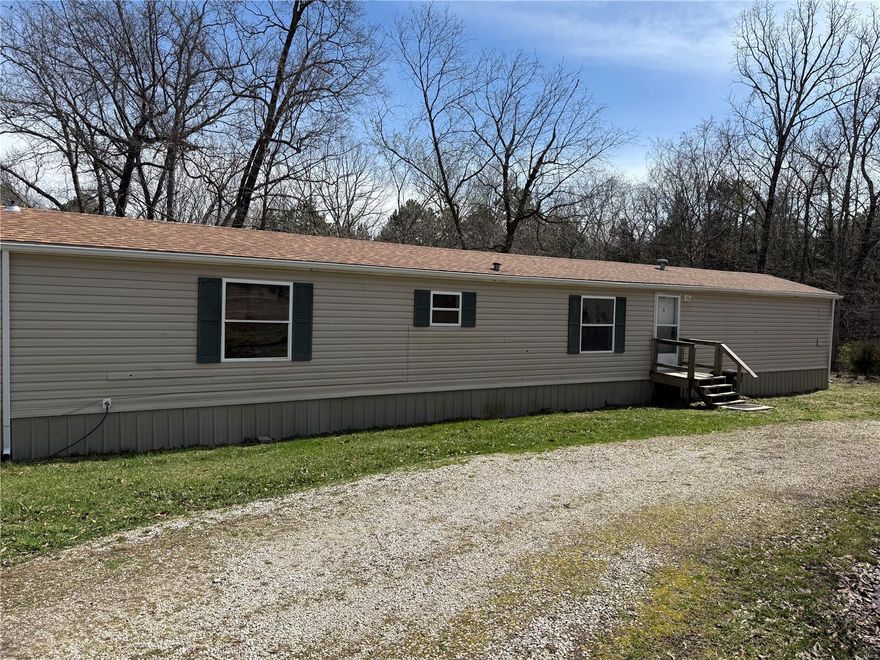 **Charming 3-Bedroom Manufactured Home on Expansive Lot!**

Discover this delightful 3-bedroom, 2-full bath manufactured home situated just outside Potosi, offering the perfect blend of tranquility and convenience on approximately 3.97 acres. Home has new carpeting in bedrooms and brand new roof. Septic tank was recently pumped/cleaned and add a new drain field. 
 This inviting property features a spacious yard with a circular driveway, providing ample space for outdoor activities and gatherings.
Enjoy the benefits of country living while being just minutes away from local schools and downtown amenities. Whether you're looking to relax in your large yard or explore the nearby community, this home presents a fantastic opportunity for comfortable living. Don’t miss out on this gem—schedule your showing today!