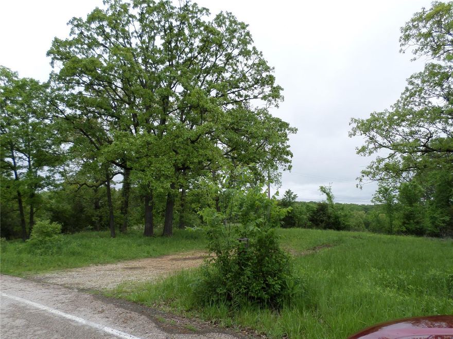 23.6 acres of rural acreage in Franklin county, lots of blacktop frontage on Old State Rd. and also about another 200 ft of frontage on Flint Hill rd.  At top of the hill on Old State is entrance to property where you can drive into parking area. There is a nice building site at that point and an old bed of iris's, where old original homestead was. No restrictions, no assessments. Land is mostly open, some woods for hunting, small farm pond. Nice views of rolling hills. There is an overhead power line across one section of property.