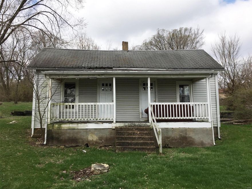 INVESTORS!!! Older Park Hills home on a 98x168 lot. Needs lots of work but has potential.  Major remodel or teardown and start from scratch, you decide.