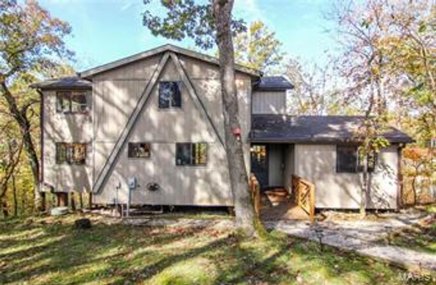 POINT LOT, PANORAMIC VIEWS OF 20 ACRE LAKE KITZBUHL!!! Fabulous, spacious Timberline A-frame chalet with two large master bedrooms on the main floor, expanded kitchen and beautiful enlarged great room wrapped with floor to ceiling windows tongue and groove cedar on the walls, and a large stone fireplace. Plenty of room for family and friends in the full size loft with two more private bedrooms and second bath. Enjoy the views of the lake on the expanded deck or fabulous private lakeside dock. This chalet is fully insulated with all double pane windows and extra insulation under the chalet. Large storage shed perfect for a golf cart on driveway plus additional large storage shed built in underneath.