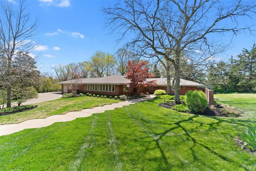 Open Sunday April 25, 1-3 PM! This private, mid-century modern Creve Coeur ranch resides on a cul-de-sac on over an Acre lot in the Award Winning Ladue School District! This 5 bedroom, 4.5 bath architectural gem expands over 4,200 square feet on the main floor plus offers extensive recreation space in the lower level. Stunning gardens and a shaded patio overlook the level grounds. The clean lines, open spaces, cozy nooks, sun, and hearth rooms make this home the perfect place to call home. Relax in the spacious, vaulted master bedroom suite featuring a gas fireplace, large walk-in closet & master bath featuring dual sinks, heated floors, separate soaking tub and shower w/ access to the exterior hot tub. Art Gallery entry foyer, 14 skylights, chef's kitchen, floor-to-ceiling windows, updated hardwood floors throughout, climate-controlled wine room and multi room indoor/outdoor speakers complete the luxuries you expect from this home. Architectural shingle roof-2020, Zoned HVAC and more! Additional Rooms: Sun Room, Wine Cellar