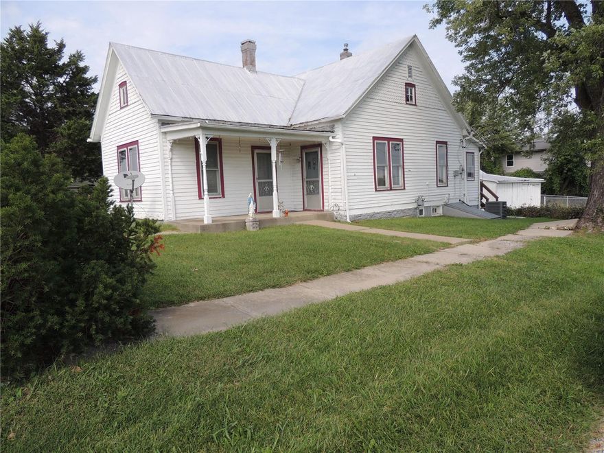 The house was built in 1890 and is being sold as is. Zoned C-4 Commercial General and Highway Business. Located on the corner of Hwy J and N Fourth St. Has great Hwy I-70 visibility. Public water, sewer and all city amenities. Ideal opportunity for your new business or office. Great investment!!