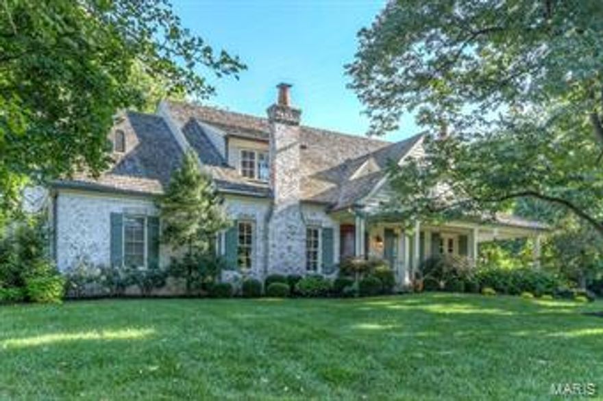 You will fall in love with this custom Hennessey-built 9 year old Ladue home. With 4 bedrooms, 3 full baths, 2 half baths & over 4,800 square feet of living space, this home speaks to today's luxury buyer. Find many unique finishes, including some Old World European hand finishes & wide plank floor. The brick exterior incorporates a hand, whitewashed finish, extensive stone work, real board & batten shutters & wrought iron hardware. Inside, find a 2-story entry with limestone floors & a formal Living Room with a wood-burning fireplace. The Great Room features a vaulted ceiling with exposed beams & a stone wood-burning fireplace. The open kitchen has an oversized island, granite counters, custom cabinets & a 6-burner gas stove. Laundry room off of kitchen. The main floor master suite has high ceilings, 2 walk-in closets & a luxurious bath with an indoor & outdoor shower! There are 3 bedrooms upstairs with 2 full baths plus a loft space. Recreation room above the 3-car garage. Additional Rooms: Mud Room