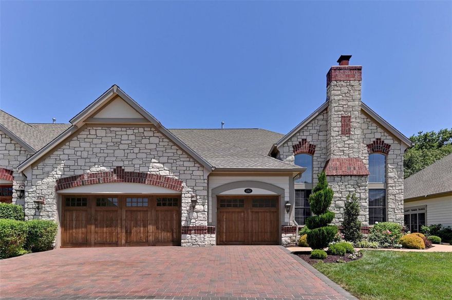 This 5 BR/5 BA,  5,376 sq ft luxury villa with spectacular views of golf course and lake has the touch and detail of the designer who lived here!  She added $40k of lighting so guests could enter to a well-lit 11 ft ceiling grand entry and custom moldings & millwork throughout the home to give the taste of luxury. Elegant kitchen with St. Louis Closets pantry, 50” cabinets and full – to the floor – windows letting in nat light.  The custom molded archway leads you to the GR with over 18 ft ceilings and window wall.  LL offers lg storage space, exercise rm & 5th BR.  Garage has been updated with entire wall of California Closets,  and custom Polymer epoxy flooring.  This interior designer thinks of every detail!  
For the very reasonable price of $325/mo you can get a newly renovated club house with indoor/outdoor dining, fit. facility, 4 clay tennis courts with pro and drop-in programs, pool with food/drink/towel service and sep children’s pool for grandkids or guests. Additional Rooms: Workshop/Hobby Area Location: Suburban