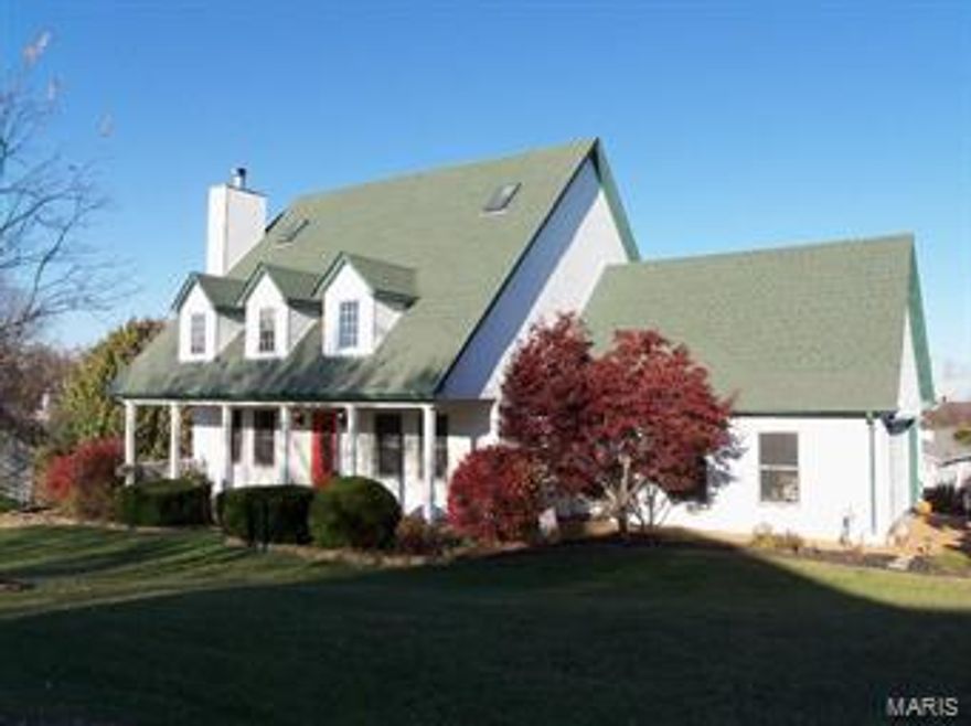 Gorgeous custom built home with generous open floorplan featuring quality upgrades, 3500+ sq ft of living space on over a quarter acre corner lot! Fantastic kitchen, 42" cabinets, newer countertops and newer laminate-wood flooring through to the adjoining breakfast room. Great room, stone wood burning fireplace, and thermal windows throughout. Main floor master suite with walk-in closet, luxury bath, double sinks, soaking tub, and separate shower. Oversized upstairs bedrooms feature walk-in closets and soaring cathedral ceilings with skylights. You have to see these bedrooms to believe the size! Full finished walkout lower level with rec room, den, 4th bedroom/office, full bathroom, and ample storage. Main floor laundry, oversized 25x25 side entry garage, 24x12 deck, huge covered porch, beautiful landscaping provides curb-appeal and privacy. HUGE home with a great Fenton Location. Timberside road repairs are currently being addressed by the HOA board of trustees.