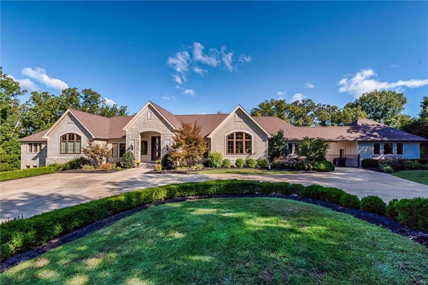 A beautifully appointed 2006 Homer Award winner characterized by a beautiful blend of custom stone and the magnificent symmentry of architectural details. Over 7000 SF on 4.7 acres of wooded privacy and private pool. Enter the foyer through 10’ Mahogany doors to the distinctive interior finishes. The enormous kitchen/hearth rm are truly the heart of the home. The master bath is a retreat w/ custom cabs, huge jet tub, walk-in shower w/ 2 heads & body sprays & flatscreen TV. Spacious secondary ensuite bedrooms.  3250 SF of LL finish is complete w/ 2nd kitchen, full bath, BR, TV & billiard area, gym, locker rm w/ steam shower, rain shower, & body sprays. Additional features include security system w/ cameras, intercom, central vac, Lutron lighting, irrigation system & 3-zoned HVAC system, & 3 garage spaces.