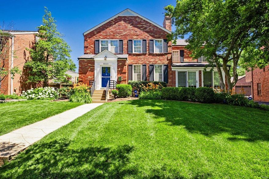 This light-filled, inviting Davis Place home offers a perfect blend of classic elegance and contemporary living. Step into a large, welcoming living room that leads to a sunny dining room which seamlessly connects to an eat-in kitchen. A large, bonus living area on the main level provides additional space for relaxation or gatherings. Upstairs, you'll find three generously sized bedrooms, including a primary suite featuring a spacious walk-in closet (which can be converted back to a fourth bedroom) and an elegant ensuite bath. The two additional bedrooms share a well-appointed hall bath. The lower level offers even more flex space and plenty of storage. Above the detached three-car garage, discover a fully equipped living area with a rec space, kitchenette, bedroom, laundry and a full bath—perfect for in-laws or guests. The lovely outdoor area completes this exceptional home, offering a serene space for relaxation or entertaining. Located near area schools, parks, retail, and eateries.