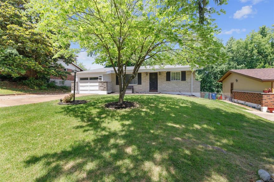 Welcome to this 3 bedroom, 2 bathroom ranch style home. The well manicured lawn enhances the curb appeal and welcomes you home. The living room features a custom focus wall for tv/electric fireplace and greets you with hardwood flooring that continues throughout the main floor. The eat in kitchen has coordinating stainless steel appliances, lots of cabinet/counter space, custom backsplash and a slider to the covered deck (with a ceiling fan to help cool you off) overlooking the backyard. The dining room offers an additional space for formal entertaining or can be utilized for whatever fits your needs. The main floor has 3 bedrooms and 2 full bathrooms. The lower level has a family/recreational room, perfect for hosting the big game. Grab a beverage and head out the slider to the patio, which is a great space for those hot summer BBQ's. Other features include: additional storage space in lower level that would be great for a workout room, office or a last minute out of town guest.