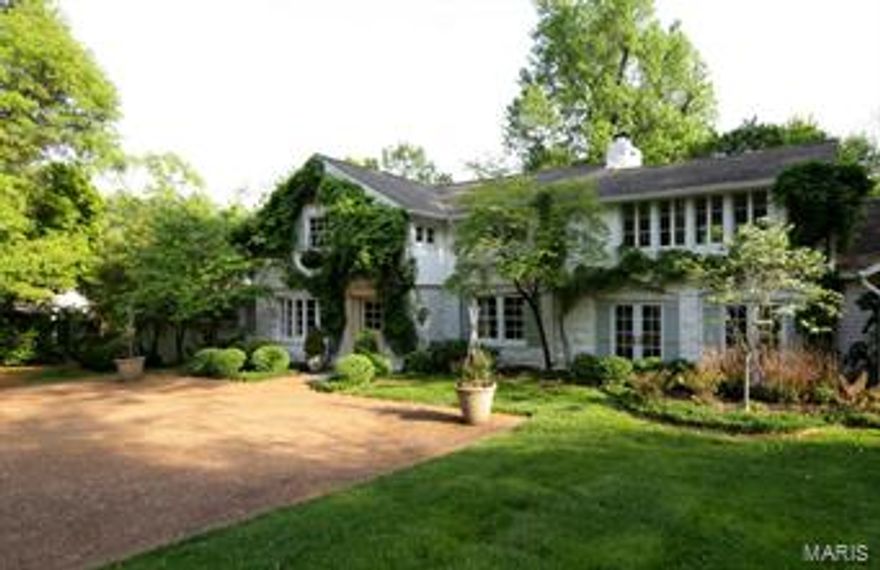 GREAT NEW PRICE!  Beautiful home on 1-acre in Ladue Schools.  Updated by Hennessey with main level Master Suite and Kitchen/Hearth Room.  Great living space opening with a southern exposure to a private level yard, terrace and gardens.  7 sets of French doors throughout provide wonderful light and access.  Features include - cathedral ceiling in Hearth Room, center island Kitchen with granite, Subzero, GE monogram and Butler's Pantry.  Family/Sitting Room with 2 sets of French doors opens to terrace and garden.  Master Suite with luxury Bath and 2 walk-in closets.  Classic Living and Dining Rooms, 3 fireplaces, Morning Room ideal for Laundry/Family Foyer, 3 Bedrooms and 2 Baths on 2nd floor plus Bonus Room, lower level Rec Room, 3-car garage and much more...