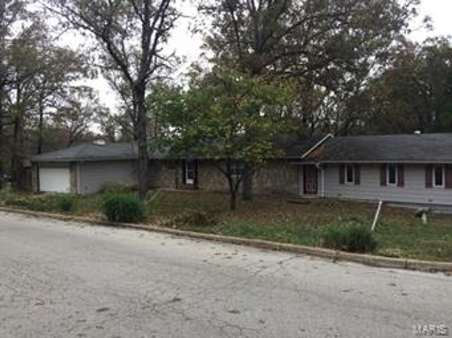 Great Home in Great neighborhood. If you are tired of looking at the same old cookie cutter homes this home is for you. Very open floor plan with 3 bedrooms and two baths upstairs. The Kitchen and dinning room open into the living room and into an enclosed sunroom that has full length windows that look out into the wooded and very private back yard. This home also has a full basement that is partially finished and has a fireplace and bar. There is also a full bath in the basement. The walk-out  basement opens into  backyard where there is almost 3/4 acre for your family to roam. The home has a traditional 2 car attached garage however there is also an attached RV garage that would Fit an RV up to 45'. This home sits on a corner lot and is vacant and ready for you to move in. Call Today! SpecialListingConditions: Foreclosure Additional Rooms: Sun Room