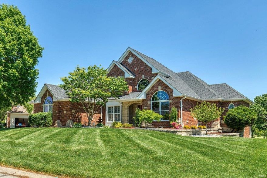 WHITMOOR COUNTRY CLUB ESTATE HOME! FULL BRICK AND STONE EXTERIOR PLUS STONE PAVER DRIVEWAY PATIO AND LARGE CUSTOM DECK WITH STONE COLUMNS OVERLOOKING GOLF COURSE-6TH GREEN, 7TH TEE AND POND! CUSTOM BUILT 1.5 STORY, MAIN FLOOR MASTER BEDROOM SUITE,PRIVATE DEN W/FRENCH DOORS AND BUILT-IN BOOKSHELVES.FOYER HAS ELEGANT CURVED STAIRCASE PLUS BACK STAIRCASE TO HEARTH ROOM, OPEN TO BEAUTIFUL KITCHEN HIGHLIGHTED WITH GRANITE COUNTERTOPS, CUSTOM WHITE CABINTRY, SUBZERO, BRKFST ROOM HAS OCTAGON CEILING,A GREAT VIEW OF GOLF COURSE,WOOD FLOORING THRU FOYER,HALL,POWDER ROOM,KITCHEN,BRKFST ROOM. HEARTH ROOM W/WALL OF BUILT-N BOOKSHELVES, 3 BEDROOMS ON UPPER LEVEL, FORMAL GREAT ROOM FLANKED BY COLUMNS, 11 FT CEILINGS AND DYNAMIC FIREPLACE.3 CAR SIDE ENTRY GARAGE, CENTRAL VAC,SECURITY SYSTEM, ZONED HEATING AND COOLING, WALK-OUT LOWER LEVEL HAS 2 SETS OF FRENCH DOORS, PUTTING GREEN, FULL BATH AND FIREPLACE.