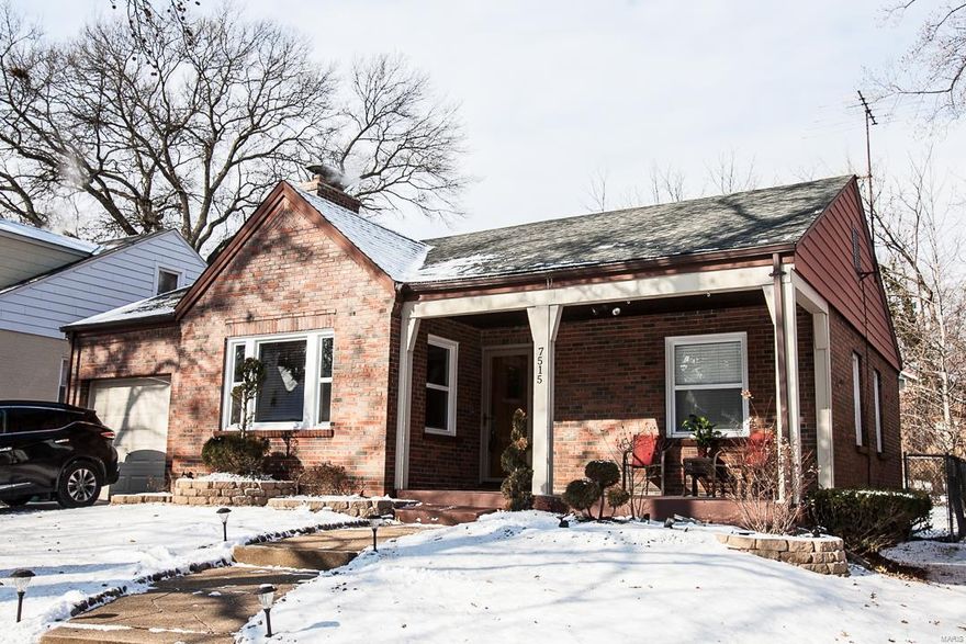 Welcome home!  Not your typical Pasadena Park house!  Plenty of room to entertain guests in spacious LR, DR, KIT, finished LL, or on the patio!!! Updates include hardwoods thruout, newer windows, updtd KIT & Baths.  Welcoming front porch! Entry door w/leaded glass insert invites you into LARGE LIVING ROOM w/Crown molding, built-in bookcase.  Cozy up to the wood burning STONE FIREPLACE w/your favorite person or book! DR opens to LR or Updtd KIT w/peninsula island, SS appl, backsplash.  Mahogany six-panel doors thruout.  You'll love the updated Roman style bath.  Fin LOWER LEVEL boasts a spacious Rec Rm (large enough to use one side as a media rm!), ART-DECO CURVED WET BAR, office/sleeping area, updtd half bath, W/D closet.  Enjoy relaxing on the patio in the fenced in backyard. Oversized attached garage. Conveniently located close to major highways, UMSL, Touhill Center, restaurants, places of worship and public transportation including the Metro Link.