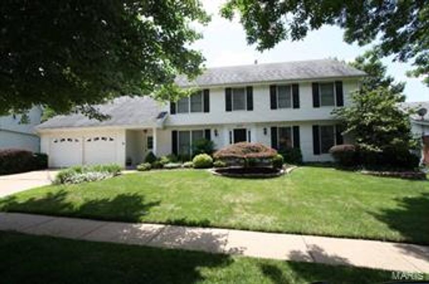 The best of both worlds! Great subdivision & beautiful home that offers newer Brazilian wood floors, new carpet, June '15; formal DR w/newer chandelier, attractive window treatment w/crown & chair molding. Living rm also has crown molding & pretty window treatment. Updated Kitchen & adjoining breakfast rm features granite counters, stainless appliances, a center island & a newer Pella door leading to a covered area of the deck...perfect for outdoor dining. The family rm offers a fireplace flanked by built-in bookcases and an atrium door to the sitting area of the deck. Large MBR is neutral & spacious with a redone luxury bath offering a footed soaking tub, separate shower, tile flr & double sink vanity. The add'l 3 bedrooms are large & neutral. The W/O LL has another FR, a full bath, recessed lighting and an office that could be a 5th BR. To complete this package is a main flr laundry, attractive landscaping and a gorgeous, fenced back yard. Seller offering a CBG Home Protection Plan Additional Rooms: Mud Room