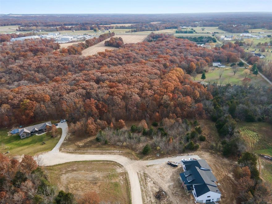 You’ve finally found it – the perfect property to provide privacy and a beautiful surrounding, located in the Troy school district! This stunning 3.3 acres is wooded and is a great spot for your custom build. The property sits minutes from Highway 61 in private subdivision and dead end road. The possibilities are endless! The subdivision restrictions and plat is attached. This lot has an exclusive builder, Luke Harke, buyer must use him to build. Additional Rooms: In Platted Subdv.