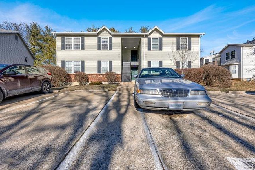 Welcome to this stunning upper-level condo with a dramatic vaulted ceiling and gleaming hardwood floors! This 2 bedroom, 1 bath home features classic appointments throughout. You will love the two large bedrooms. The serene primary bedroom boasts a bay window and ceiling fan. The newer sliding glass door leads to a private 11x9 deck with a storage area that overlooks mature trees. The kitchen is the ideal place for entertaining with a large breakfast bar and double sink. The dining room is filled with an abundance of natural light. The spacious great room is the perfect place to relax. Newer windows and the HVAC is only 10 years old. The laundry room is just off of the kitchen! This sought-after location puts you close to shopping, restaurants, and the Page extension. Assigned parking spot in front of the building for your convenience and ample parking for guests. This is the condo you have been waiting for! Location: End Unit, Upper Level