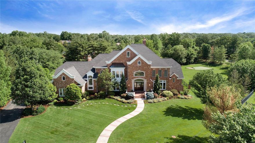 *New Price*Spectacular home offering approximately 10,481sqft total living area, professionally decorated - updates galore including newer gourmet kitchen & newer luxurious master bath, situated on 2 private manicured acres in Town & Country. Main level: two story entry, two story great rm w/fireplace & wet bar, dining rm w/marble floors, paneled library w/box beam ceiling & built-in bookcases, vaulted kitchen w/granite counters, center island & breakfast area open to vaulted hearth rm w/fireplace, master suite w/sitting room, master bath w/double vanities, whirlpool tub & stall shower, laundry rm, 2 half baths. Second level: 3 add.  bedroom suites, homework area or home office, 2nd laundry rm. Finished lower level: recreation rm  w/fireplace & wet bar, TV rm, exercise rm, 5th bedroom & full bath, pool bath w/shower, additional half bath. Outdoor living rm w/fireplace & kitchen, pool, hot tub, putting green. 4 Car garage. Generator. Close to highways & hospitals - this home has it all!