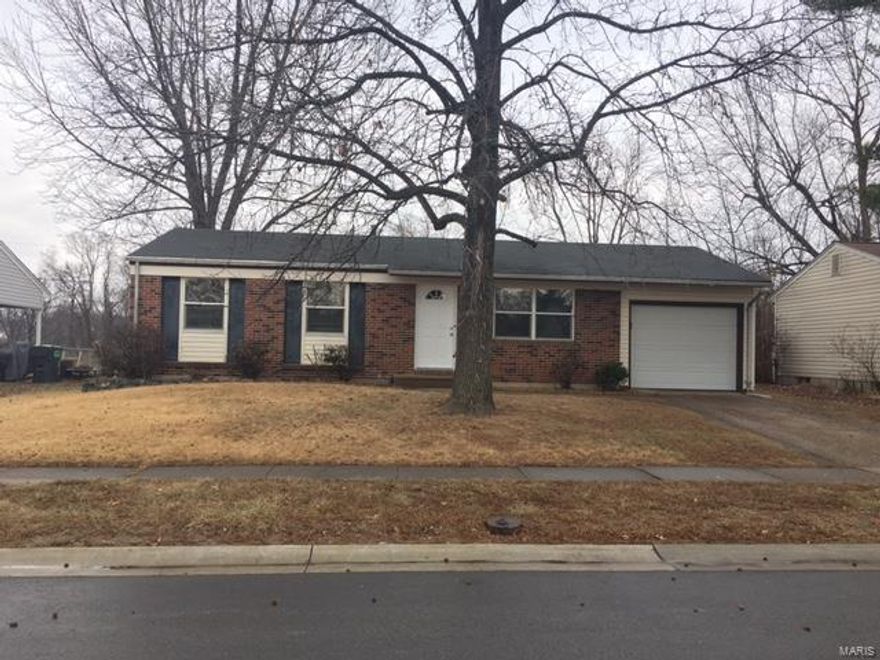 Cute ranch home that has recently been painted and new carpet installed 02/04/2017. This home is so cute and move in ready. Spacious family room 3 bedrooms and full bath. This eat in kitchen has upgraded cabinets*ceramic tile backsplash and tile flooring. Service door to a covered patio and huge fenced in back yard that backs to common area. Master bedroom has a walk thru to hall bath. Updated hall bath with ceramic tiled shower and tile floors*newer vanity. Some hardwood floors under carpet. Nicely finished lower level with spacious rec/room and den that also has new carpet and paint. Oversized 2 car garage*updated tilt windows* updated a/c*vinyl siding. Close and easy access to major highways