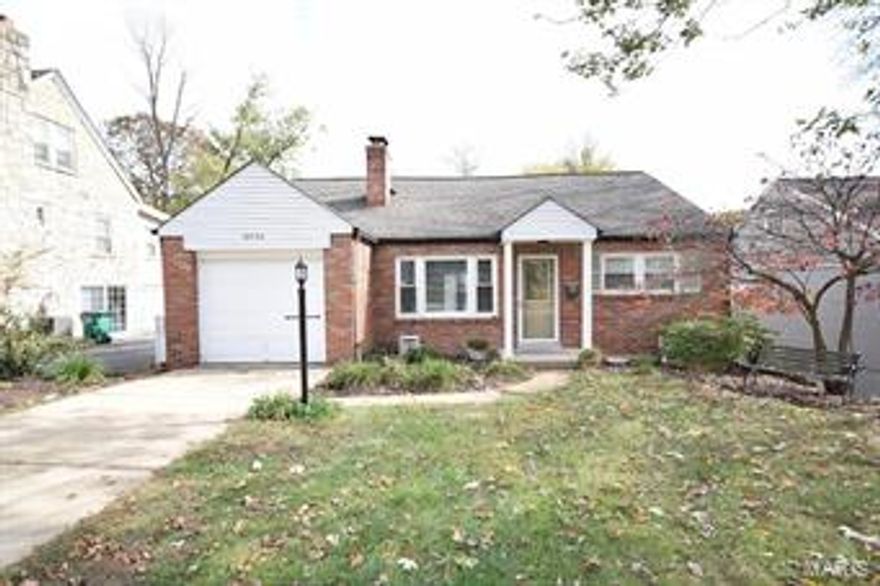 Wonderful opportunity in the 63144.  This all brick home has 3 beds and 2 full baths.  Updated kitchen w/ new cabinets.  Wood burning fireplace w/ mantel, gleaming hardwoods, recessed lighting, updated fixtures, built-ins, lots of storage throughout, fantastic workshop and new energy efficient dual pane windows.  Blow your mind upper level master suite with new carpet and a renovated bathroom featuring a seamless glass shower, separate tub, double sinks and custom tile.  French doors lead out to the large deck that overlooks a huge level fenced backyard, walkout finished lower level and a one car attached garage.  Walk to restaurants and Tilles Park.... did we mention Webster Schools?  Schedule your private viewing today...