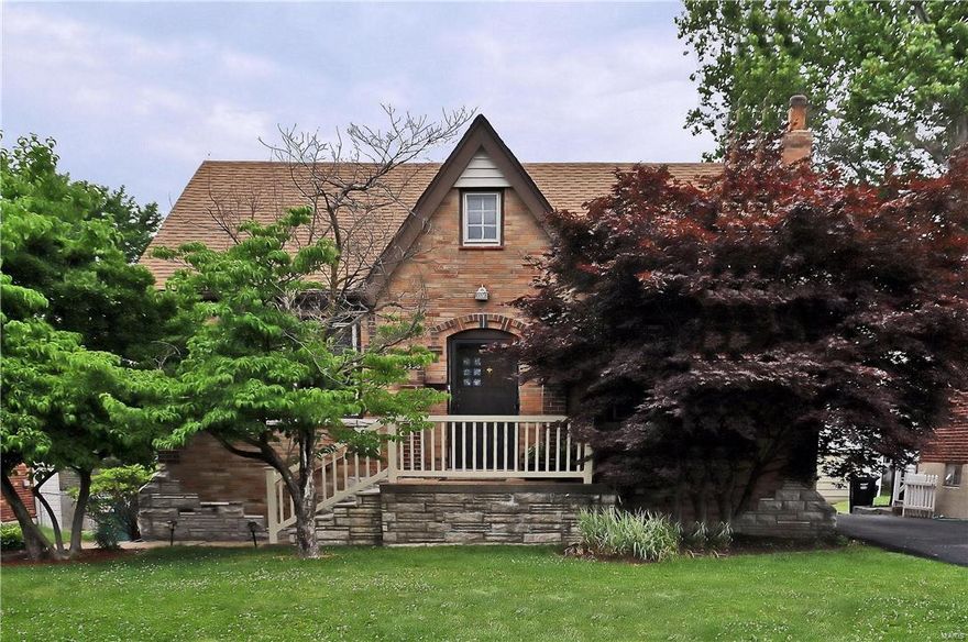 Charming Affton 1.5 story, with lots of curb appeal, features 3 bedrooms, 1.5 bath and approximately 1330 square feet of comfortable living space.  Special amenities include a striking brick and stone exterior, wood and tile flooring, peaked doorways, cove ceilings, stained glass and glass block windows, ceiling beams, and an updated kitchen and bath.  A 3 season sun porch opens from the kitchen and overlooks the yard through 3 walls of windows.  The walk-out lower level has laundry facilities and plenty of storage space.  Additional amenities include a detached 2 car garage.  this home sits on a level lot, with a fenced yard and a stone patio.  Conveniently located just minutes from shopping, dining, and major commuter routes.