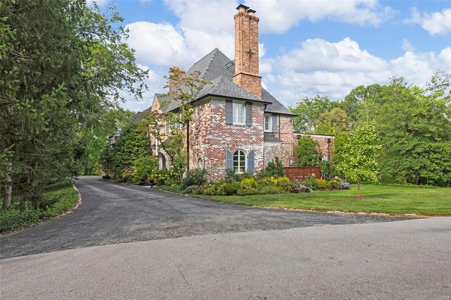This STUNNING historical estate w/recently restored carriage/pool house designed in 1927 by Maritz & Young includes heated pool, patio, brick terrace & lovely mature gardens/trees in a park-like setting on 1.8 acres! This is truly a dream home w/incredible original features & modern conveniences. Improvements made since 2021 by the current owners include:complete roof replacement, new gutters & downspouts, carriage house restoration, luxury kitchen renovation w/Wolf & Subzero appliances, fresh paint throughout, new carpet, new custom pool cover, new HVAC system in parts of main home, 2 tankless water heaters, updated powder room, added pantry & coffee bar, & much more! Main floor laundry area. This spectacular, spacious all-brick French Revival manse is a perfect retreat on a private gated street & located only 10 minutes to Clayton, 15 minutes to Lambert, near major highways, Mercy Hospital, Missouri Baptist Hospital, fabulous public and private schools, and numerous other amenities.