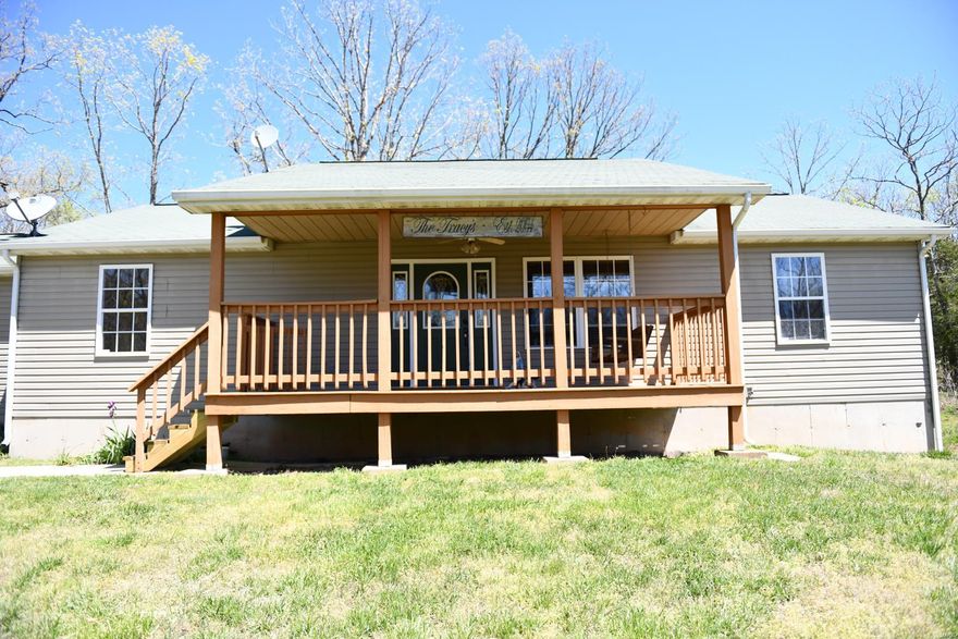 Just minutes from I-44, this maintenance free home sitting on 16+/- ac. is waiting for you.  This property has plenty of room with its 3 bedrooms, 3 baths and 2 additional sleeping areas in the basement.  Other features include a spacious kitchen with center island, seperate dining area, and a large master bath with whirlpool.  Outside you will enjoy a covered deck with a swing and a large yard perfect for entertaining.