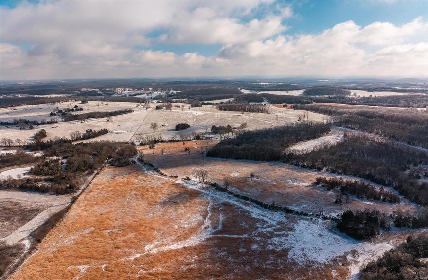218-acre property offers the perfect balance of cattle farming and prime hunting land, making it an ideal investment for those seeking both agricultural and recreational opportunities. Boasting expansive views of the surrounding landscape, the property features fertile pastureland for grazing livestock, while also being home to outstanding hardwood trees that produce abundant acorns—attracting wildlife and providing excellent hunting opportunities. With two designated building sites, you have the flexibility to build your dream home or hunting lodge, all while enjoying the natural beauty and tranquility of this exceptional piece of land. This property has an older cabin that would make a great hunting camp and an additional building spot with all utilities, if you're looking to raise cattle, hunt, or simply enjoy the panoramic views, this property offers it all