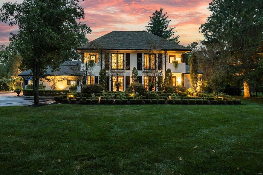 Located in one of Ladue’s premier neighborhoods, this classic-styled 1.5 Sty features sophisticated interior detailing & extensive renovations throughout. Gracious entry foyer leads to formal living room & beautifully appointed dining room with beamed cathedral ceiling, marble fireplace & 8’ French doors that open to terrace. Designer kitchen featuring white cabinetry, granite countertops, commercial grade appliances, 7’ center island, built-in breakfront & convenient planning center adjoins breakfast room, family room with wet bar & granite fireplace with handcrafted mantel and light-filled sunroom with cast stone fireplace. Primary bedroom suite with 2 walk-in closets (1 with laundry) & vaulted sitting room with 4th fireplace offers an appealing retreat. The 2nd floor extends the living quarters with 2 additional ensuite bedrooms with sitting rooms & private balconies plus 2nd laundry. Situated on a .7-acre lot with terrace & resort style pool surrounded by landscaped gardens.