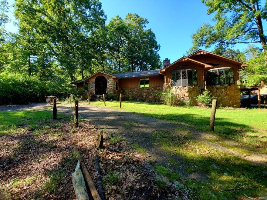 INVESTORS! Beautiful, big unfinished home sitting on 3.57 acres that has alot of potential. In addition, there is an in-ground swimming pool that needs repaired along with a shop that needs some updating.  There is mold in the home that needs removal.