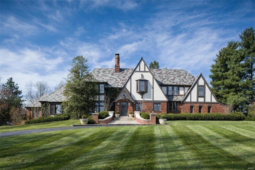 On a 1.88 acre gorgeous,park-like property sits a magnificent English Tudor where architectural details of yesterday seamlessly combine with updates and additions for today’s living.  A step down living room with terrazzo floors, lead pane windows, gas fireplace and over nine foot ceilings adjoins a new study with built in bookcases and cabinetry, hardwood floors and a vaulted ceiling and opens to the gracious dining room and a gallery with a wall of windows to create inviting spaces for more formal gatherings. The chef’s kitchen with large center island, Wood-Mode cabinetry, and top of the line appliances opens to a bright and cheery breakfast room and hearth room featuring over 9 ft. ceilings, hardwood floors, built in bookcases and a gas fireplace with cast stone mantle. The luxurious main floor master bedroom suite and bath offers his and hers walk in closets with built ins, French doors to the terrace, and a spa like bath. Heated pool,main floor laundry and bluestone terrace.