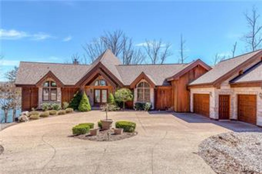 Custom Lindal Cedar home on beautiful Lake Alpine, luxury lakeside living at its best! Soaring ceilings greet you as you walk into this stunning lake home. Floor to ceiling windows overlook the lake with easy access to your own boat dock for waterside fun. You will be overwhelmed by the views from the great room which has gathering space for a crowd w/stone fireplace & separate dining area. The adjacent large entertaining kitchen is great for parties & for everyday living. But prepare to be surprised with a lower level that is as spacious and open as the main level with a second kitchen area, game room, second fireplace and walk out to the back yard and lake practically at the doorstep. This home is full of wonderful space for entertaining year-round both inside & out with its enormous deck, screened porch & yard area. The bedroom space is plentiful and you will sleep well knowing you are in a superior home like none other. Prepare for great fun & surprises at this beautiful lake home! Additional Rooms: Mud Room