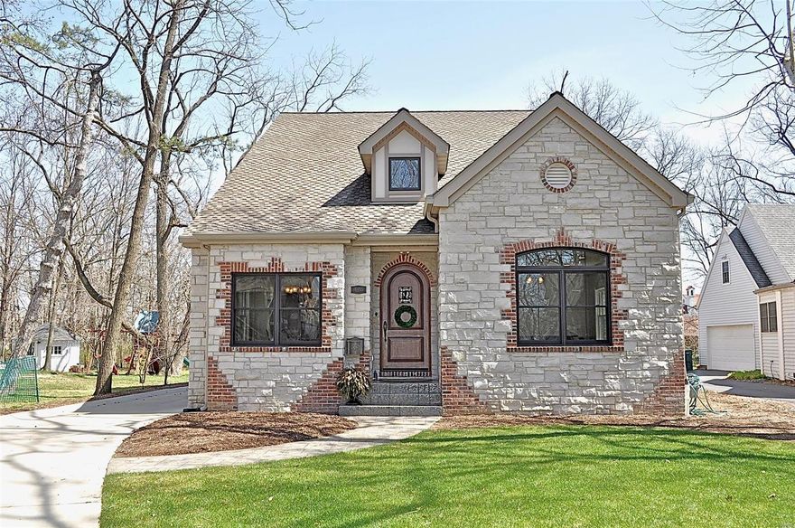 Spectacular, nearly new custom-built home, with all of the bells and whistles, presents a rare opportunity.  Special features include; two-story great room with brick and stone fireplace, gorgeous kitchen with eleven foot island of unpolished granite, Wolf stainless appliances, a butler’s pantry, vaulted ceilings in master bedroom with large custom closet and travertine stone bath.  The scraped oak hardwood flooring, custom cabinets, and wrought iron railings throughout, make for a classic feel. The private back patio off of the great room makes it a natural space for entertaining. There is an oversized three-car garage at the back of a gorgeous, large yard, just two blocks from downtown Kirkwood. Please see attached features document for a full list of details on the construction.