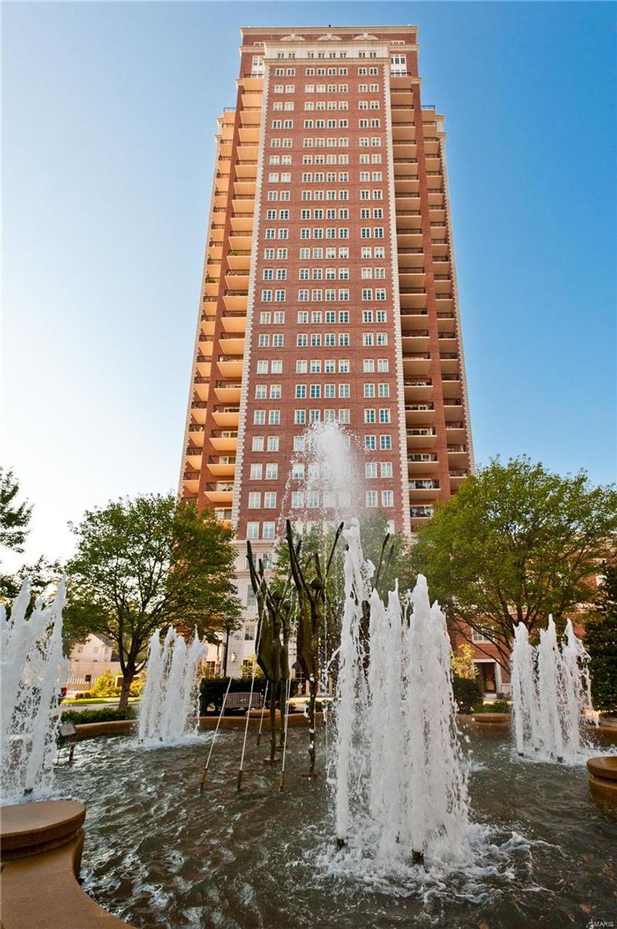 Located on the 22nd floor with northeastern exposures and soaring Arch views, the home has been opened and improved to provide modern living and entertaining. The grand dining and living rooms offer an elegant flow and feature a wet bar with SubZero refrigerators, elaborate moldings, a gas fireplace, and two private terraces. The eat-in kitchen hosts custom cabinetry, commercial appliances, a center island, a breakfast area, and patio access. A dramatic library adjoins the primary en-suite bedroom with Arch views, a custom walk-in closet, and a spa bathroom with stone accents. Additionally, there is a gorgeous powder room, 2 guest bedrooms, a Jack n’ Jill bathroom, a laundry/mud room, a generous storage locker and 2 parking spaces.   The Plaza in Clayton Residences offers world-class services, including valet, concierge, club room, health club, swimming pool, dog run, rooftop park, and electric charging station. Location: Corner Location, Downtown, End Unit, Retail Center, Upper Level