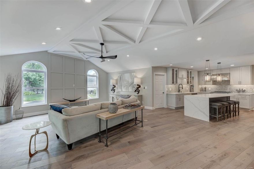 Luxury living & high end modern finishes are perfectly combined in this completely renovated ranch. Sitting on almost an acre lot in Town & Country this 4 bed, 4 full bath home exudes quality in every inch of its 4,500 sq. ft of living space. It’s packed with upgrades starting with oversized quartz top central island, backsplash made of Italian marble, designer hood and gas range, Z-Line Brand, 42” kitchen cabinets  wood floors, baths’ floors and walls covered with Spanish porcelain tiles, built-in shelves. Master bath has additional space for 2 closets, freestanding bathtub & clear glass shower. Fully renovated LL offers 4th bed with egress window, full bath, rec room, wet bar with wine cooler, multipurpose room. Huge kitchen perfectly flows to vaulted FR & 4 season room. Main floor laundry has new washer & dryer. New zoned HVAC & 2 water heaters, new electrical 200 amp panel
Enjoy entertaining & relaxing on a newly paved patio & retaining walls. Beautiful private level backyard. Additional Rooms: Mud Room, Sun Room