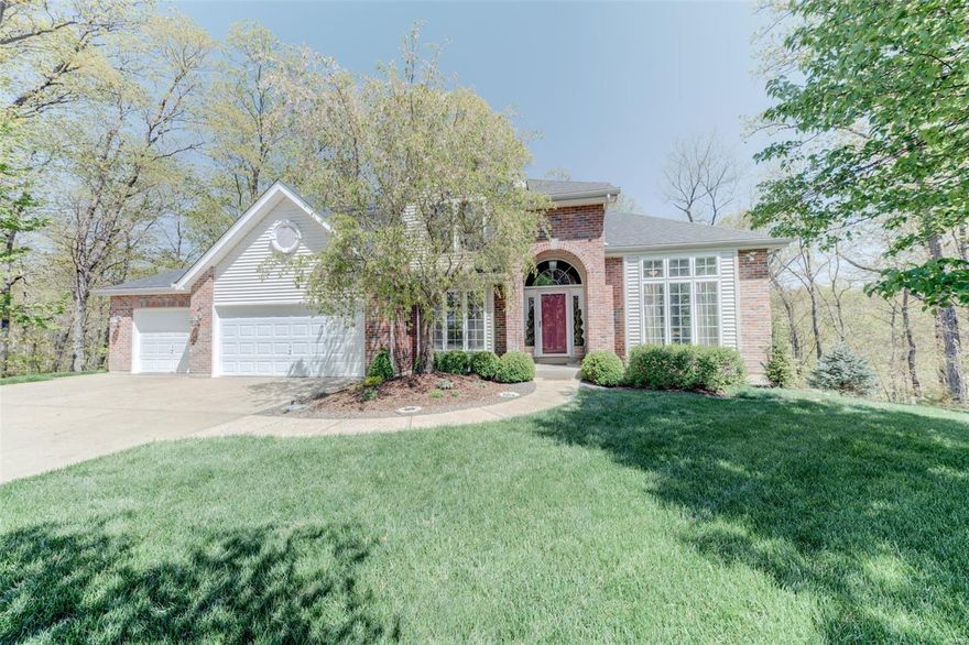 Don't miss out on this gorgeous 1-1/2 sty on 1.8 wooded ac in the gated community of Augusta Shores.  The 2-sty entry has wd floors & is flanked by a DR on one side & LR on other. It offers a main floor mstr ste w/10'ceilings and sep jet tub & shower, along w/dbl sinks.  From the bath you can walk out onto the huge deck to view nature at its best!  Down the hall is a powder rm, laundry rm & newly-remodeled kitchen & brkfst rm.  The kitchen boasts custom cabs w/pull-outs, a center isle w/elec cooktop, black granite sinks & SS appliances. The brkfst rm has a slider to the spacious deck. You'll enjoy the view from all the windows in the vaulted GR, natural light from the skylights & warmth of the f/p.  Upstairs boasts 2 bdrms, plus a loft--could be a 4th bdrm, & a full bath.  The w-o bsmt awaits the buyer's finishing.  Augusta Shrs offers 4 stocked lakes, tennis cts, pool, pavilion, clubhouse, 233 ac of common grnd & is minutes from wineries. Katy Trail & Klondike Park are across street.