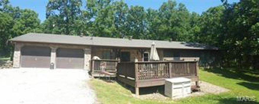 Don't let this one getaway. This remarkable 4 bedroom, 2 Bath, open floor plan, all situated in a private-wooded setting. Call for your private showing today. 573-368-8025 Additional Rooms: Mud Room