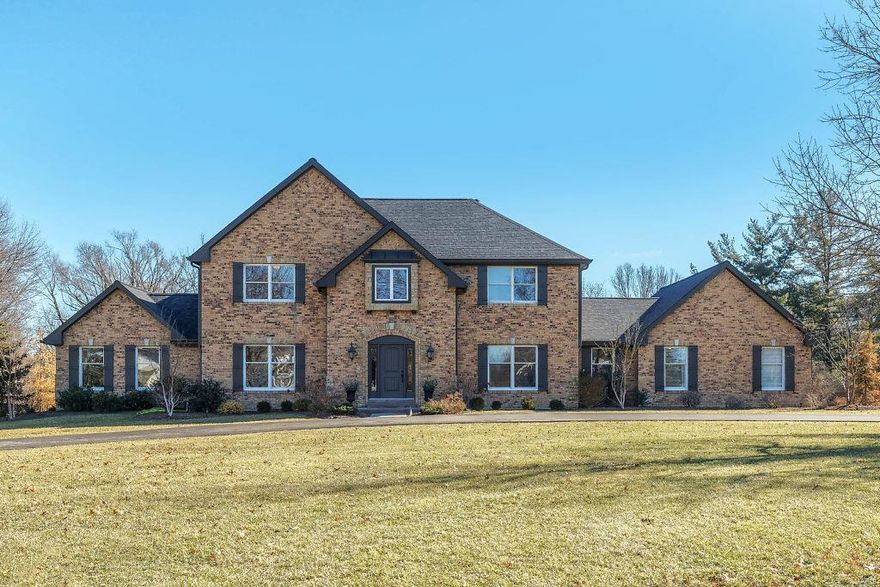 Classic-styled brick 2 Sty on 1-acre cul-de-sac lot! This Kelly-built home features gleaming wood floors, extensive millwork, custom built-ins & an integrated sound system. Impressive 2-sty entry foyer opens to formal living & dining rooms, vaulted study, spacious family room with bookcase & brick fireplace flanked by palladian windows & guest suite. Designer kitchen with 42” glazed cabinetry, granite countertops, commercial grade appliances, 9’ center island & butler’s pantry adjoins light-filled breakfast room with pass-through wet bar & sliding glass door to patio. Master bedroom suite with customized walk-in closet & marble bath with shower spa plus 3 generous-sized additional bedrooms, 1 with ensuite bath, & hall full bath complete the 2nd floor living quarters. Lower Level includes recreation room with floor-to-ceiling brick fireplace & wet bar, game room & workout room. Atrium doors open to outdoor living area with stamped concrete patio & pool surrounded by landscaped gardens. Additional Rooms: Mud Room