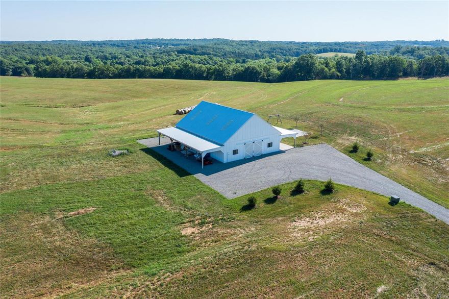 120 m/l acres of rolling terraced property with new shop and Sand Creek running through the back! Mostly pasture with creeks and wooded spaces. This property is ideal for a Homesite, Airbnb, Winery, and more! Road frontage on F Hwy and Bloom rd. Beautiful property with views in all directions minutes from Farmington. The shop has 400 amp electric service, well, septic and is set up with bathroom and could easily be finished.