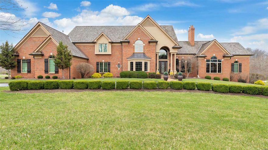 Step into unparalleled luxury. This exquisite 7,600 sq. ft. estate is perfectly positioned on a lush 0.87 acre lot overlooking the fairway of the prestigious St. Albans golf course. Grand circle driveway greets you into the grand foyer, flanked by formal dining with rich hardwoods that lead to the great room featuring soaring ceilings, stunning window wall, fireplace and wet bar. Gourmet kitchen boasts stone counters, custom cabinetry, spacious island and SS appls., flowing seamlessly into the adjoining breakfast and hearth rooms. Elegant primary suite with ensuite bath: walk-through shower, dual vanities, WI closets. A study, two half baths and laundry complete the main level. Upstairs find three ample guest rooms, each with a full bath. Walkout lower level is perfect for entertaining: family room, bar, rec. space, office, guest room, sauna, and full bath. Backyard is a private retreat - enjoy the  60’x12’ covered deck, grill and serene views. 3 car garage - extensive upgrades list.