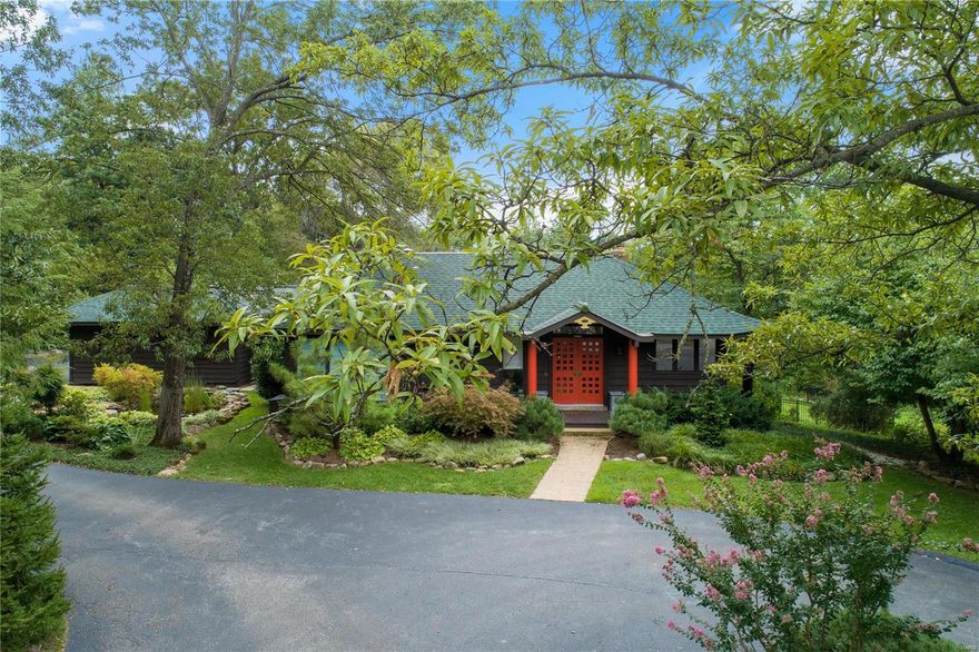 This stunning contemporary open concept 5 bd home with palatial grounds will surprise and delight. Elegant and unpretentious, you’ll feel instantly at peace as you’re drawn through the feng shui entrance into the sanctuary of this multi-level abode that unfolds origami style. Inside, discover expansive light filled living areas, dreamy bedrooms, 3 modern bathrooms and a home office on an executive scale. The home features a cozy gas fireplace, vaulted ceilings and natural finishes aplenty including a colossal stone bath, warm wooden floors, and soft timber cabinetry in the gourmet kitchen. Neutral tones and interesting angles offer endless décor options. Outside, the vast entertaining decks blend harmoniously with the property’s heavenly gardens that showcase rich autumnal trees, koi ponds, waterfalls and tranquil nooks.This breathtaking property in the award winning Ladue School District is close to all amenities. Homes of such grandeur in this enviable location are rare. Act fast!