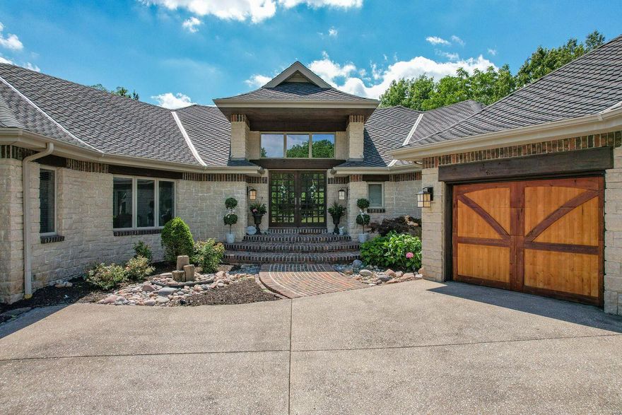 LOCATED ON MILLWOOD GOLF COURSE! AS YOU PULL INTO THE DRIVEWAY YOU FEEL THE ATTENTION TO DETAIL & QUALITY CRAFTSMANSHIP. AS YOU WALK THROUGH THE DOUBLE DOORS INTO THE FORMAL ENTRY, YOU SEE AN AMAZING 2 STORY VIEW OF THE FAIRWAY. NEXT, YOUR EYES ARE DRAWN TO OUTRAGEOUS WOOD SPIRAL STAIRCASE! THEN INTO THE SPACIOUS LIVING RM W/A STUNNING STONE FIREPLACE. THE KITCHEN IS A CHEF'S DREAM W/VIKING COMMERCIAL APPLIANCES & THE CABINETS ARE ENDLESS! FORMAL DINING SHOWS ANOTHER AWESOME VIEW & ACCESS TO ONE OF TWO COVERED PORCHES. MASTER STE. IS LOCATED ON FIRST LEVEL. MASTER BATH IS HUGE W/HIS & HER VANITIES, MAKEUP STAND, LARGE WALKIN SHOWER W/DOUBLE SHOWER HEADS & SOAKING TUB. 2ND BEDRM/0FFICE IS ON MAIN LEVEL. DOWN THE SPIRAL STAIRCASE INTO THE OPEN BUT WARM BASEMENT YOU IMMEDIATELY NOTICE THE ONE OF A KIND STONE BAR W/SMALL REFRIGERATOR, WINE COOLER & A BEER TAP. THE BASEMENT HAS TWO LIVING AREAS W/EACH THEIR OWN FIREPLACE.  A 2ND LAUNDRY ROOM & 2 MORE BEDRMS W/EACH THEIR OWN FULL BATHRM.