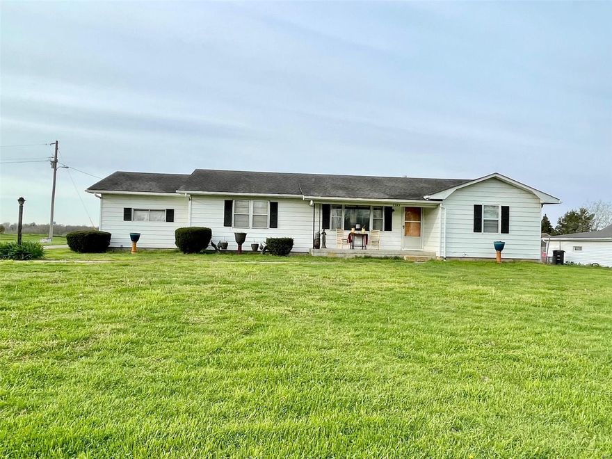 Are you looking for a home with all the perks of being in City limits but one that is situated on a 2.65 acre lot with views of the countryside? This ranch style home was built in 1960 and offers 1416 sf of living area with 3 bedrooms and 2.5 baths. The spacious kitchen offers plenty of cabinetry and counter space for the cook in the house. A separate dining room gives you plenty of room to dine with family and friends. A split bedroom floor plan adds privacy to the primary bedroom and features a decorative fireplace, adding an element of charm. The large living room can hold plenty of furniture. The full basement has a large laundry room with adjoining bath. A finished office is also located nearby. There is plenty of room for storage too. This home has an attached one car garage and an enormous backyard. The lot is zoned R-5 which could provide opportunity for future development if you choose. Motivated Seller!