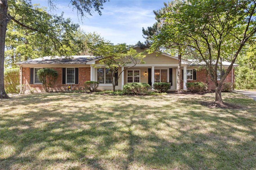 A serene drive down a tree lined street reveals an enchanting ranch home positioned on a quiet cul de sac. This 4 bed, 2 bath beauty in desired Claymont offers nearly 2300 sqft of single-level living w/fantastic flow + loads of natural light. The inviting front porch welcomes you through double doors into a foyer flanked by formal living & dining rooms. The brilliant hardwood floors continue into the family room, featuring a snuggle-inducing fireplace and a sliding glass door offering passage to a stamped concrete patio & lovely backyard. The light-filled kitchen features plenty of cabinet space & a breakfast nook for enjoying views of the garden while sipping on your morning coffee. Down the hall you will find a large primary suite w/walk-in closet, 3 additional bedrooms, & hall bath. An unfinished lower level provides loads of storage + opportunity for additional finished living area. Walking Distance to Claymont Elementary & convenient to tons of amenities. Welcome home!