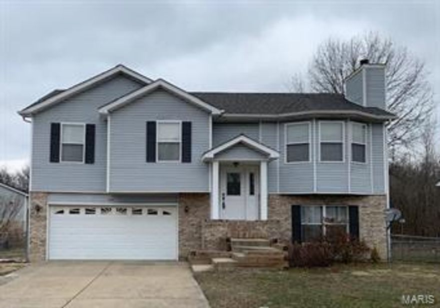 Showings begin Monday, January 28th @ 9:00am. Welcome to this nice 3 bedroom, 2.5 bath, 2 car garage home! This Split level home is "move in condition" and ready for a new buyer to move in and enjoy.  Vaulted ceilings in Great room, Breakfast room, and Kitchen.  Kitchen features large center island, tons of cabinet and counter top space, and newer stainless steel appliances. Glass doors lead to a newer (2015) large deck with staircase to the flat level fenced yard. The Master Suite has a walk in closet and private bath. There are two additional bedrooms and a full bath. Open spindled staircase leads to the finished walk out lower level that has a family room with a brick, wood burning fireplace, and a wet bar area...along with a 1/2 bath. Newer 50 year architectural roof, newer hvac, and light fixtures. This homes also qualifies for USDA financing.